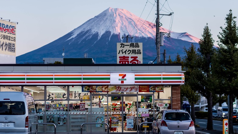 A 7-Eleven with Mount Fuji in the background in Japan