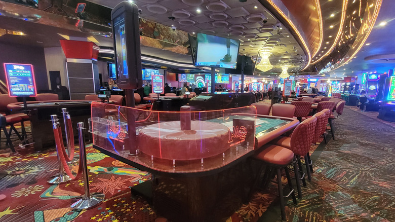 Tables inside a Las Vegas casino sit empty