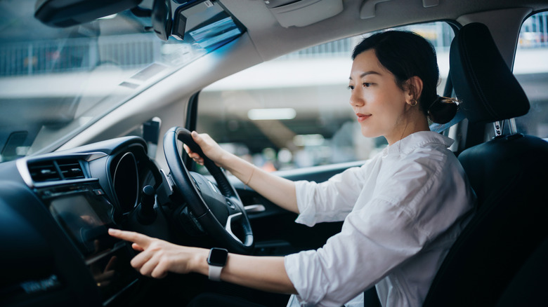 Traveler sitting in a rental vehicle