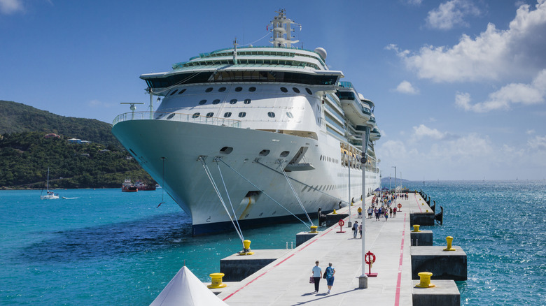 Passengers boarding a cruise ship
