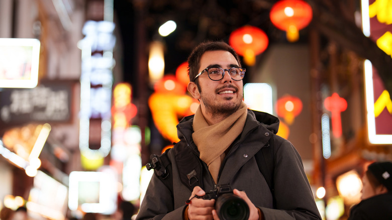 A traveler in Japan wearing glasses