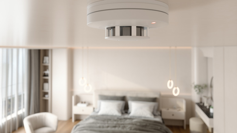 Carbon monoxide detector on bedroom ceiling