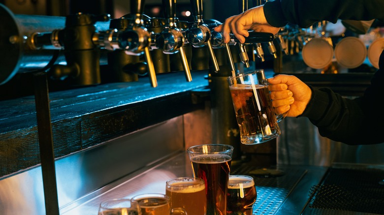 Man pouring a craft beer