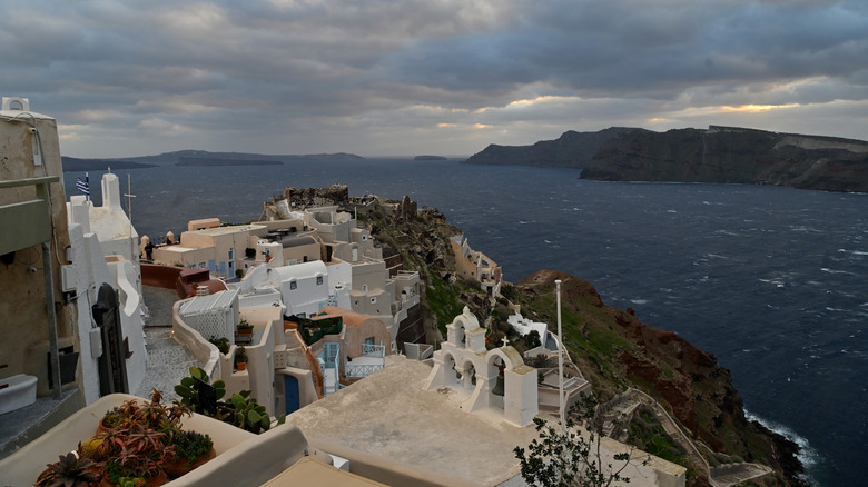 Hilltop view of Santorini village and volcanic islands
