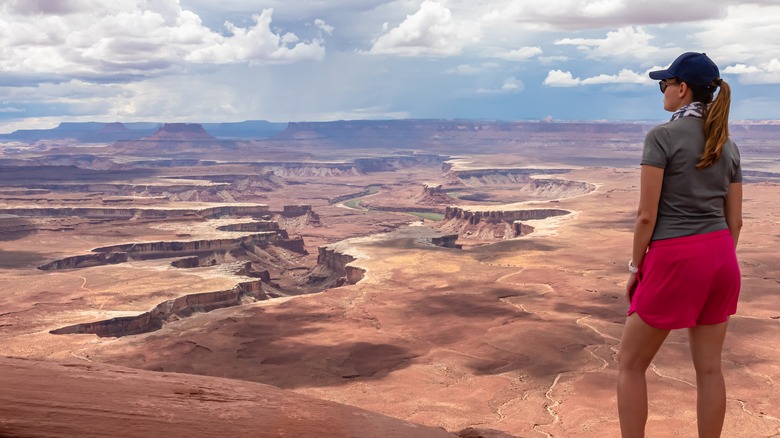 Woman overlooking Canyonland National Park