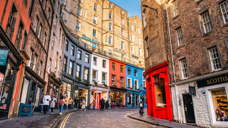 People on curved street in Edinburgh, Scotland