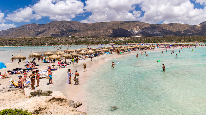 Crowded Elafonissi Beach where the sand looks a normal color and not pink