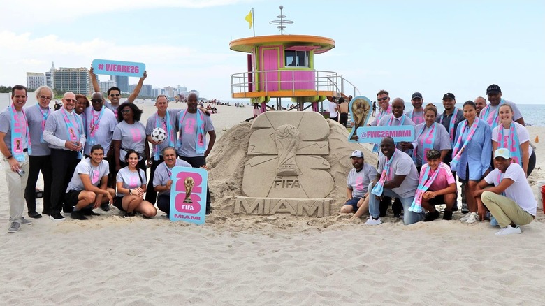 People stand near a sand sculpture at Miami's FIFA World Cup 2026 Brand Launch
