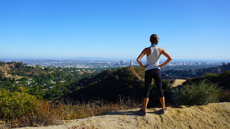 A woman on the hiking trail in Runyon Canyon, Los Angeles