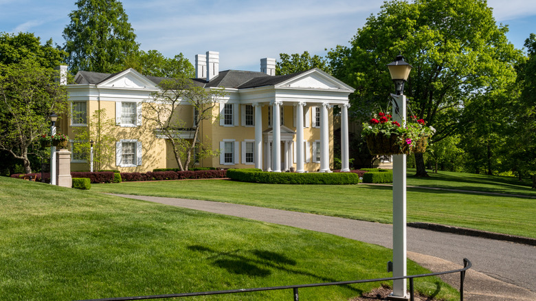 A view of the pillared entryway to Oglebay Hall on a sunny summer day in West Virginia