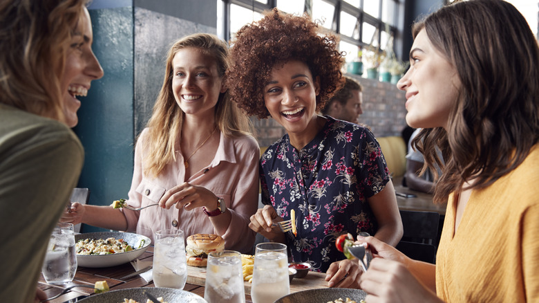 People eating together at a restaurant