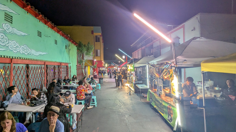 Street food vendors in a narrow alley in Chinatown, Los Angeles
