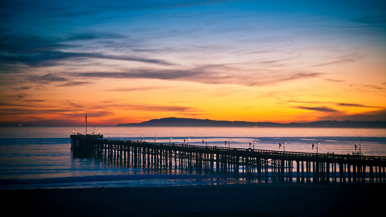 Ventura Pier under an orange and blue sky just after sunset