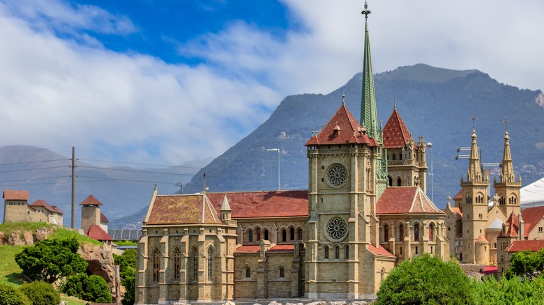 Notre Dame Cathedral in Lausanne, Switzerland, surrounded by the Alps