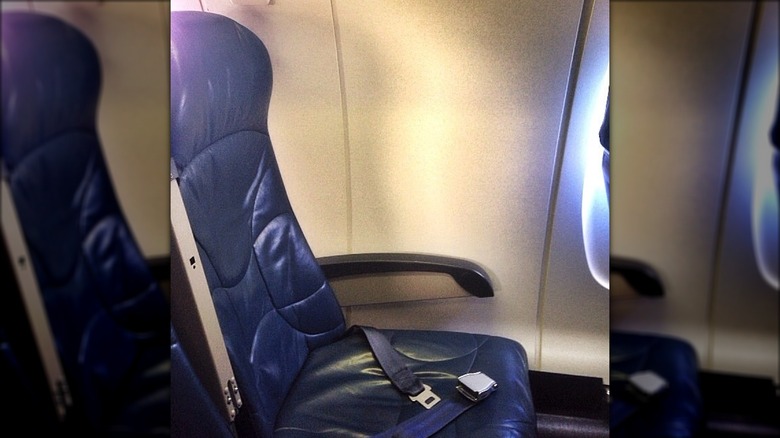 Window seat on a plane without a window