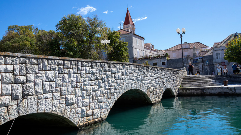 A pedestrian bridge over a canal in Trogir, Croatia
