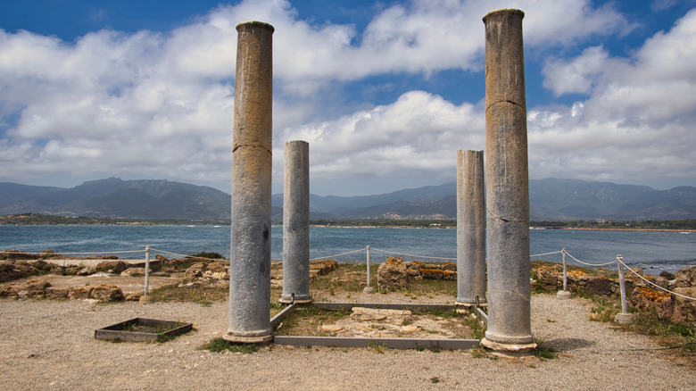 Ancient pillars by the sea in the Nora Archaeological Park in Sardinia