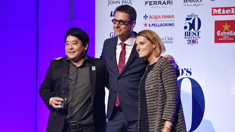 Maido chef Mitsuharu Tsumura accepting an award at the 2016 50 Best Restaurants awards