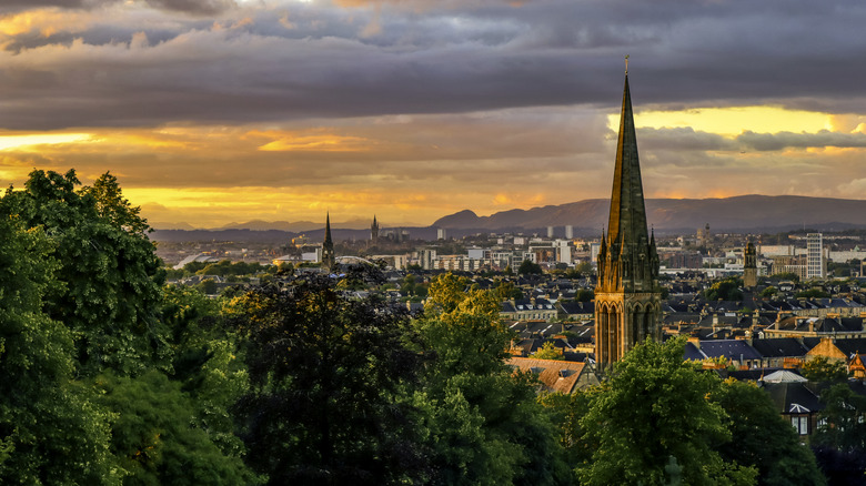 view of glasgow from a hill at sunset