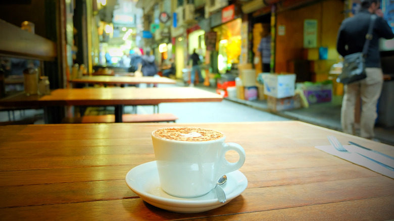 Coffee on a table in a laneway in Melbourne