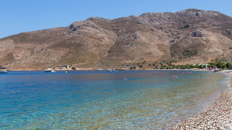 Pebble beach and clear blue water