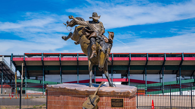 Statue of a cowboy on a horse outside of the Cheyenne Frontier Days, Wyoming