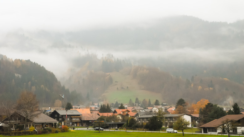 Cloud hanging on in rainy autumn morning over Lütschental.
