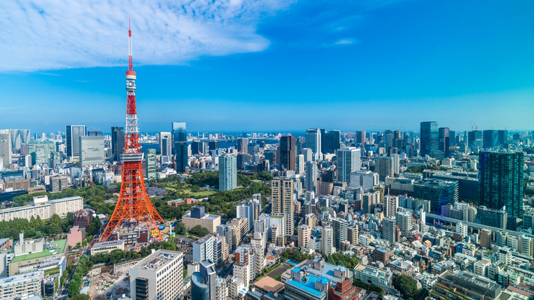 Aerial view of Tokyo skyline with clear blue skies
