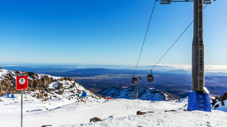 Ruapehu, New Zealand ski lift with snowy mountains