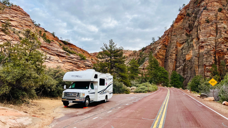 White RV parked by roadside in Zion National Park