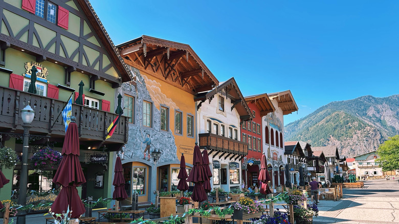 Colorful half-timbered buildings in Leavenworth, Washington, with mountains in the background