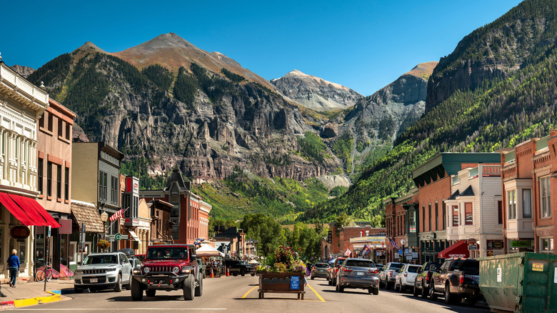 Downtown Telluride with mountains in the background on a sunny day
