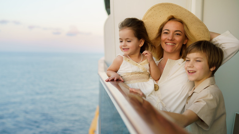Woman and two children on a cruise ship balcony