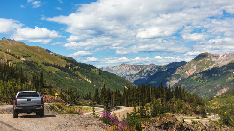 Colorado landscape with a parked car at the side