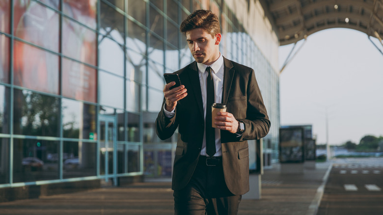 Person dressed in a suit in an attempt to get an upgrade