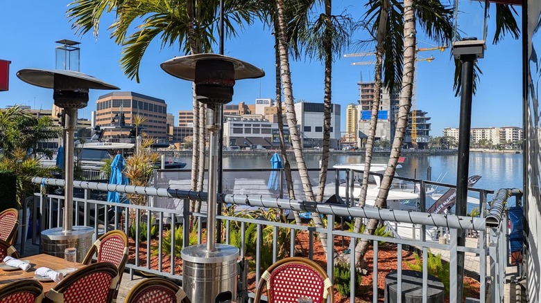A view of the boats and skyline from the patio of American Social, Tampa, on a sunny day