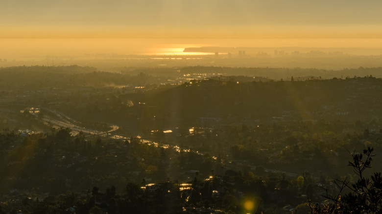 Hazy Golden Sunrise Over San Diego Bay and City Skyline Viewed from Inland Hills