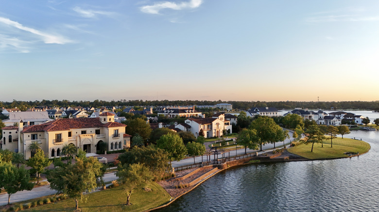 Aerial view of a wealthy Texas suburb overlooking water