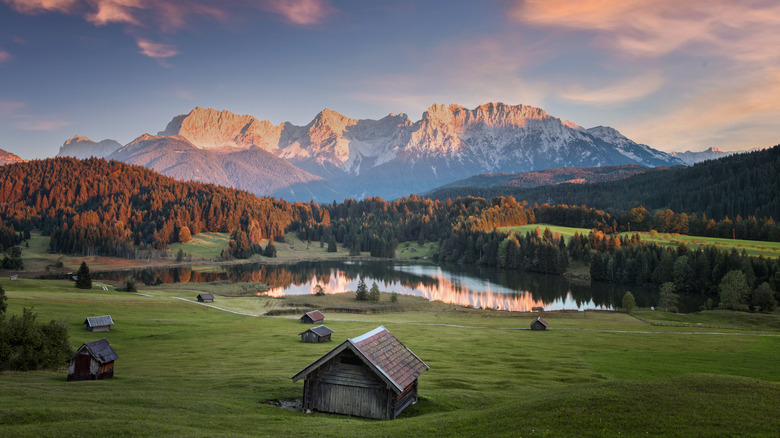 Sunset over mountains, forest, and fields in Bavaria, Germany