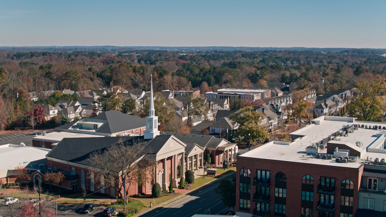 aerial view of Alpharetta with a church and other buildings