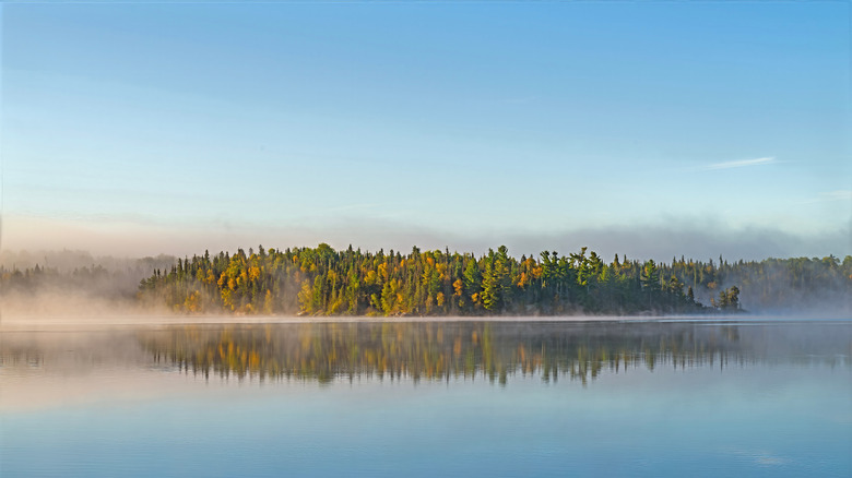 Fog over the water at Saganaga Lake in northern Minnesota.