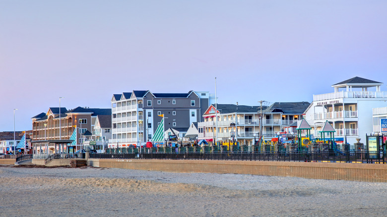 The lively and colorful Hampton Beach Boardwalk viewed from the sand