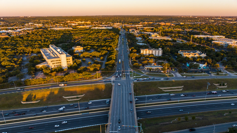 Sunrise over highways and the community of Leander, Texas