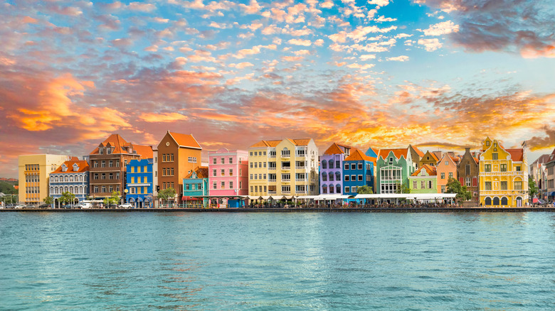 Colorful buildings on the waterfront at sunset in Willemstad, Curaçao
