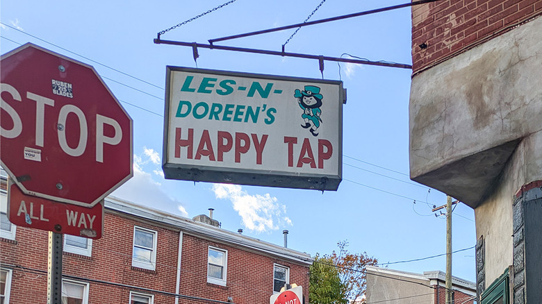 Sign outside of Les and Doreen's Happy Tap in Philadelphia