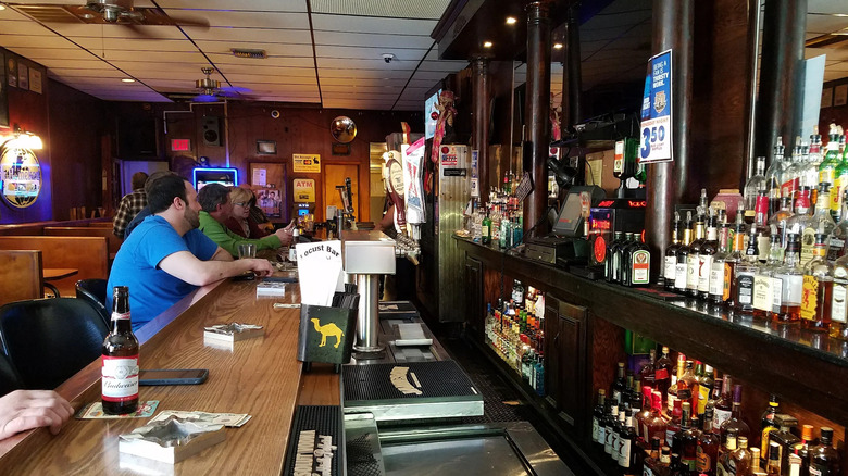 People sitting at the bar at Locust Bar in Philadelphia