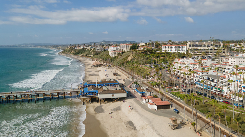 A pier pokes over the beach in the surf town of San Clemente