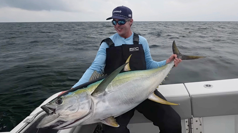 An angler shows of his yellowfin catch at Venice, Louisiana.