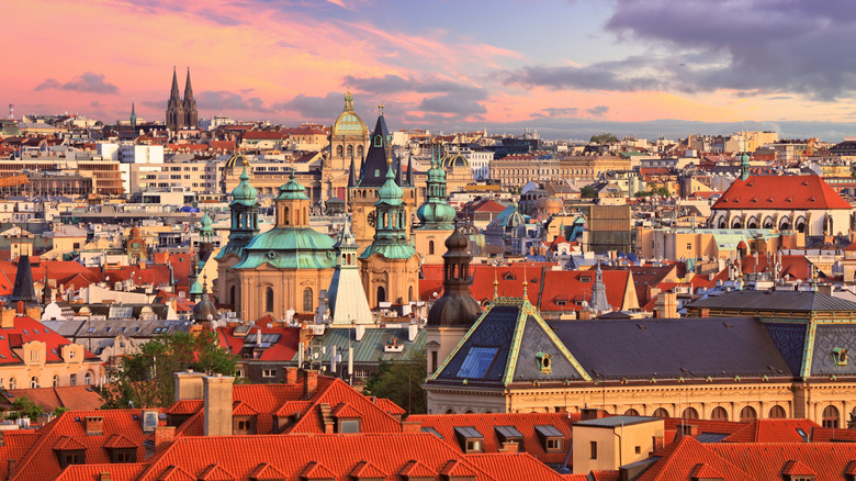 A cityscape shot of old town Prague during sunset.