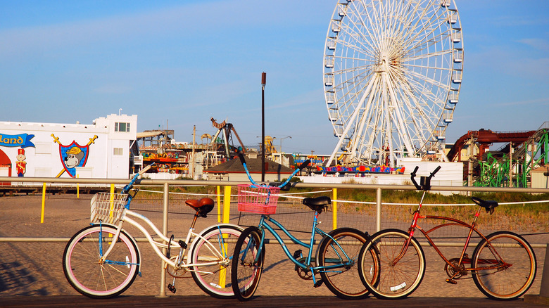 Bikes are chained to a railing along the boardwalk in Ocean City, New Jersey